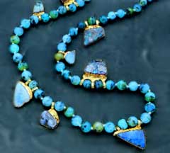 13a - lapis-lazuli necklace, valuable artifacts from Ur, lapis-lazuli was the Goddess of Love Inanna's favorite stone, Marduk built an entire entranceway for her in Babylon entirely made of this beautiful blue-hued stone, the wall is preserved in a museum 