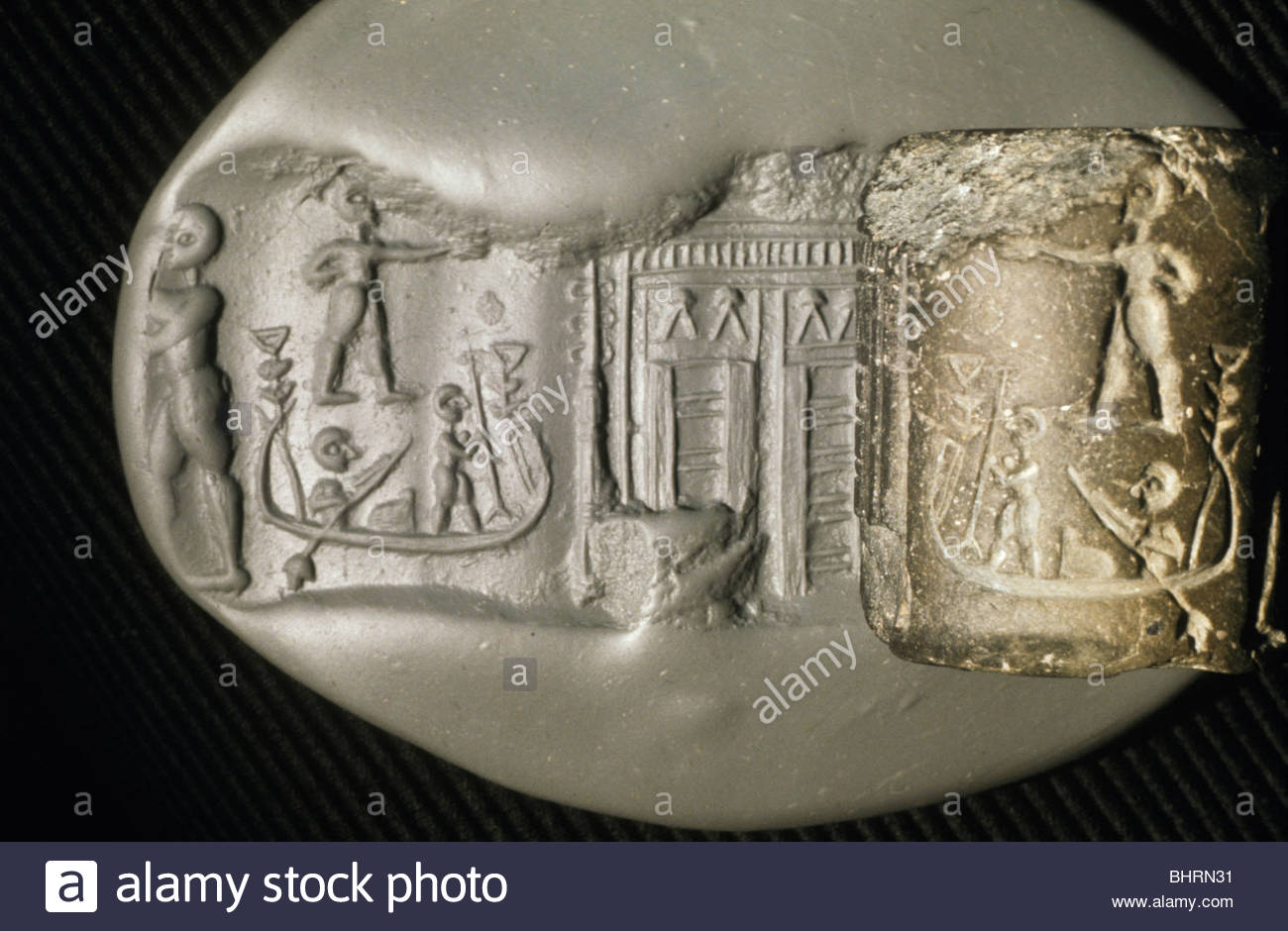 Enki's temple residence on the water's edge; ancient Sumerian cylinder seal from Eridu shows Enki's doorway to the ziggurat; this artifact in British museum