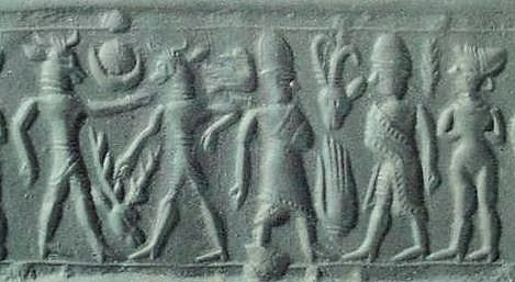 38 - Nannar's Moon crescent & Utu's Sun disc symbols; father Nannar with a semi-divine king, & his naked spouse Inanna