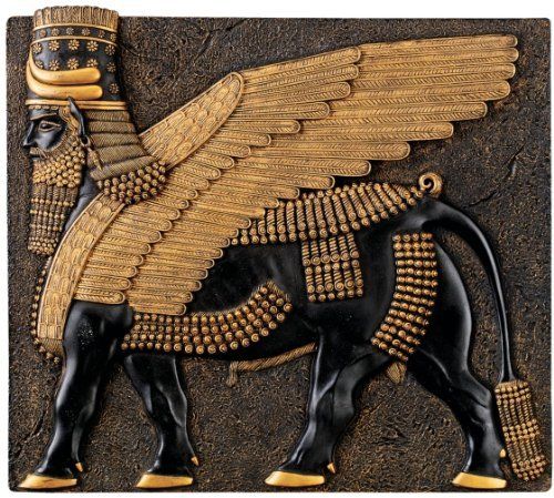 32 - unidentified displayed with Assyrian wall sculptures